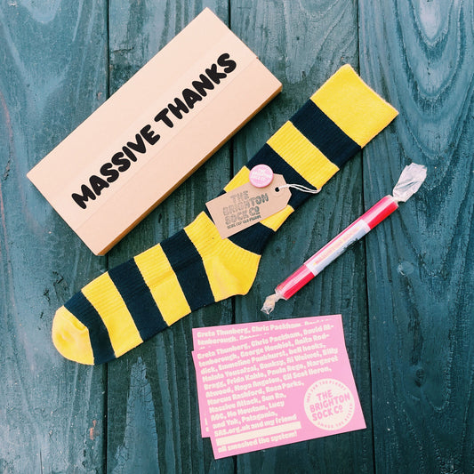 The Lanes Gift Box - yellow stripy socks, Brighton rock and free merch!